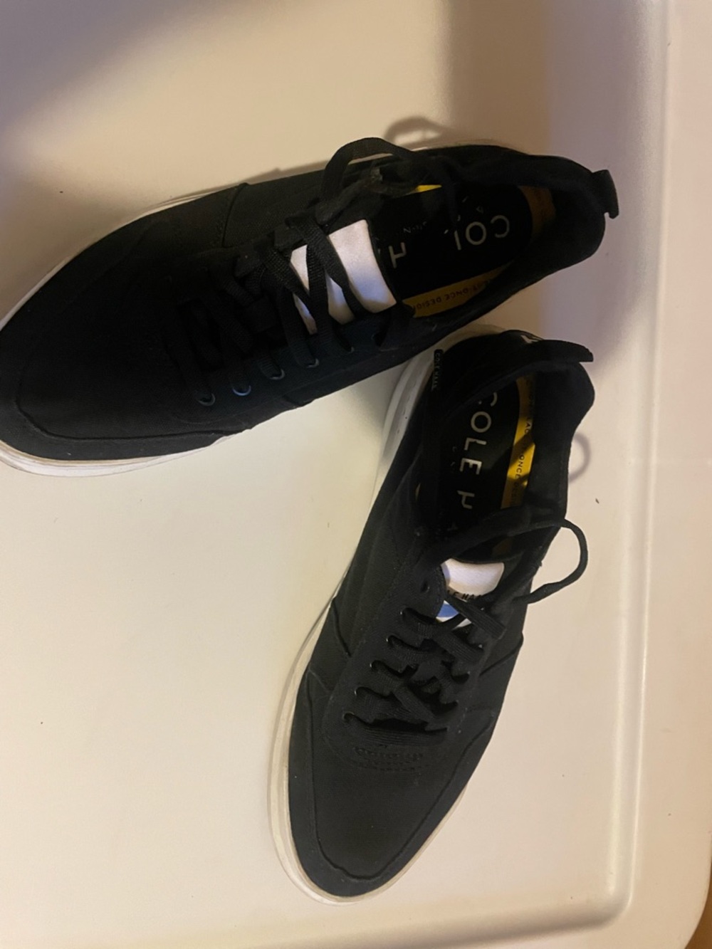 Women’s Cole Haan Black and White Low-Top Sneakers